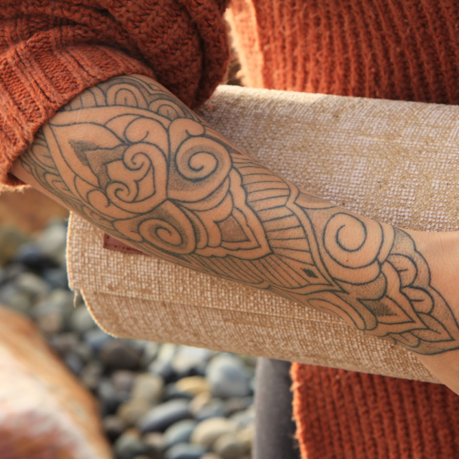 woman holding a zendara yoga mat